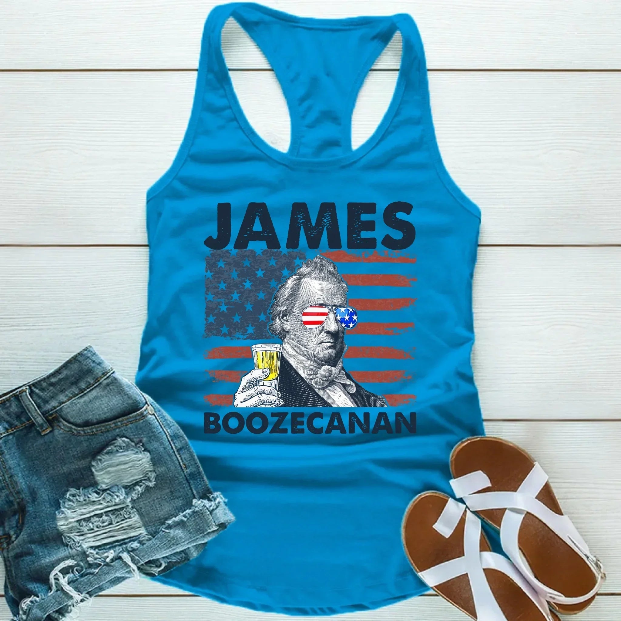 A person laughing while wearing the Adorb.co James Boozecanan funny tank top, perfect patriotic unisex apparel.