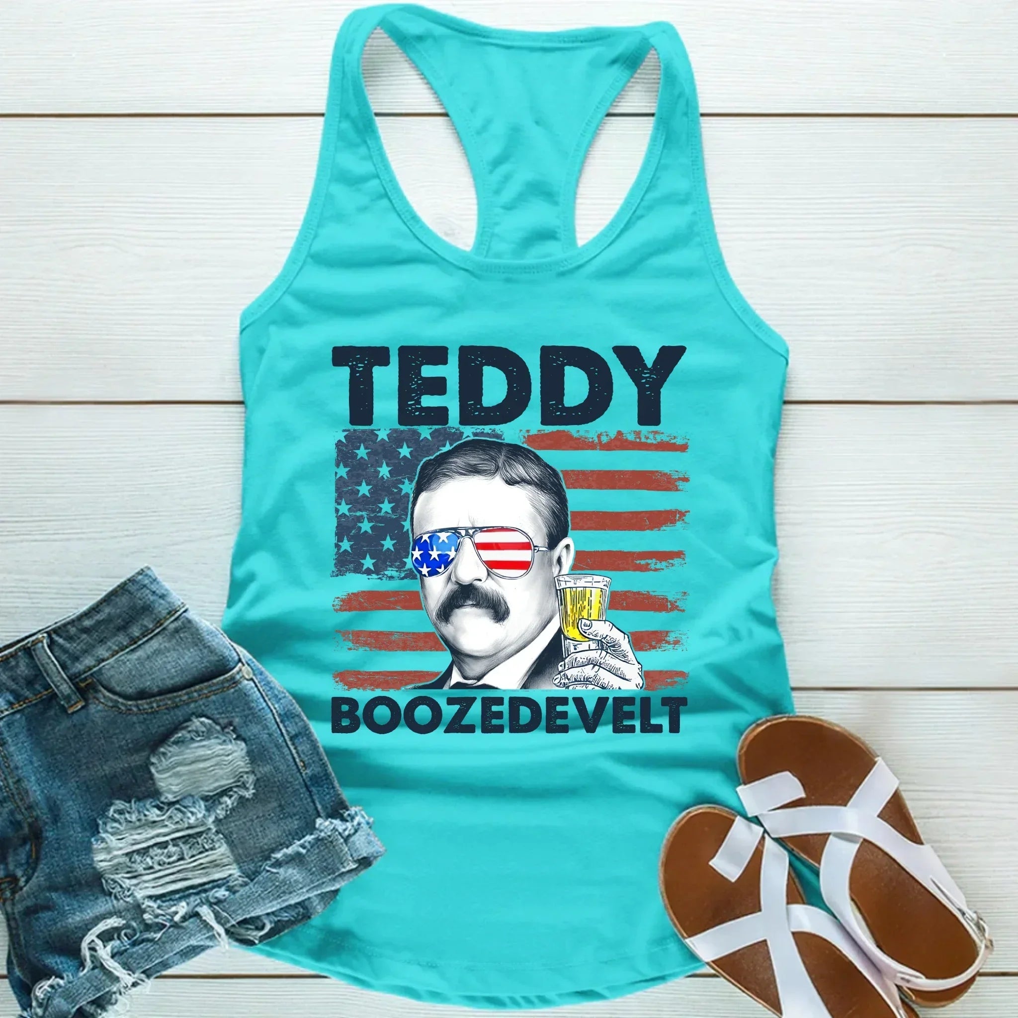A detailed close-up of the humorous Teddy Boozedevelt graphic on the Adorb.co patriotic tank top, a funny party tee.