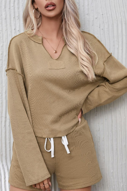 Sleek Exposed Seam Long Sleeve Top with Drawstring Short Set