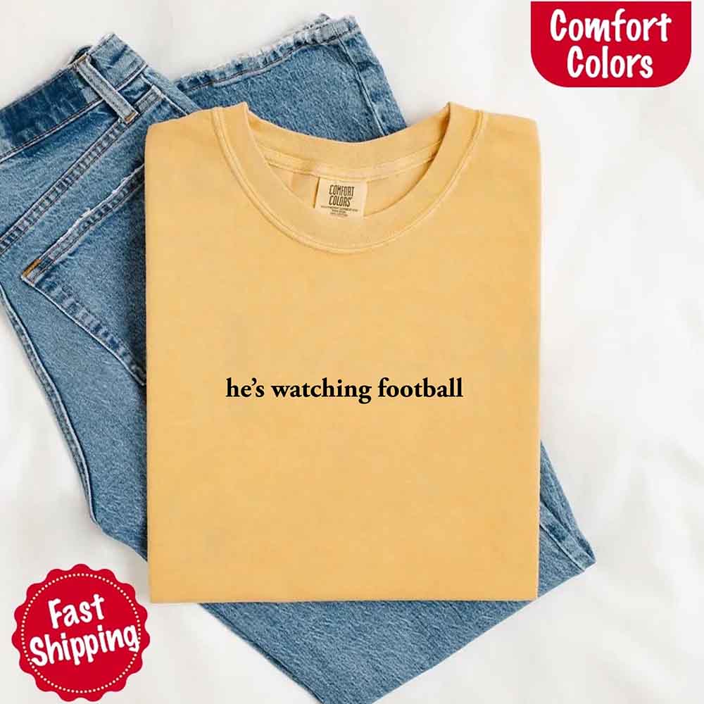 He’s Watching Football Tee - Comfort Colors Funny Shirt for Her Adorb Custom Tees