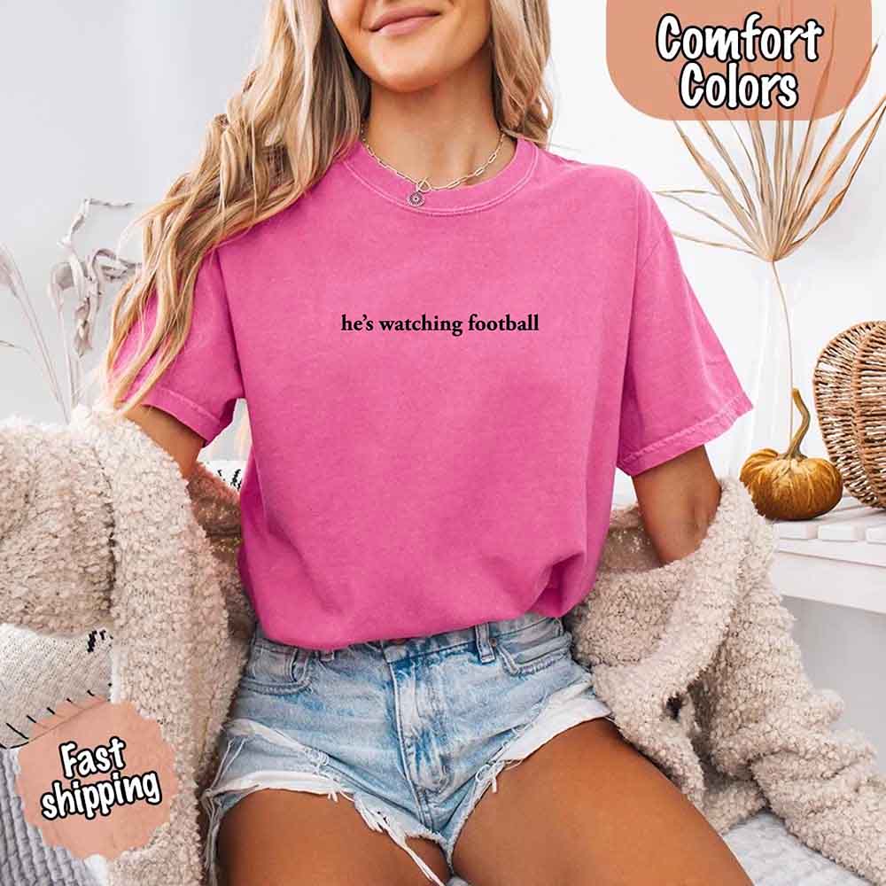 He’s Watching Football Tee - Comfort Colors Funny Shirt for Her Adorb Custom Tees