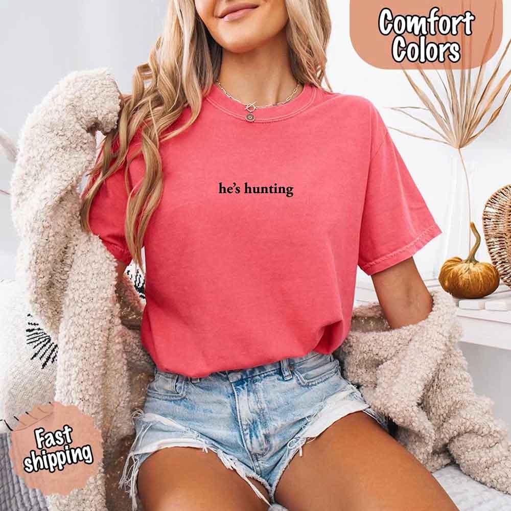 Adorb Custom Tees "He's Hunting" T-shirt in a natural setting, emphasizing its comfortable style for daily wear.