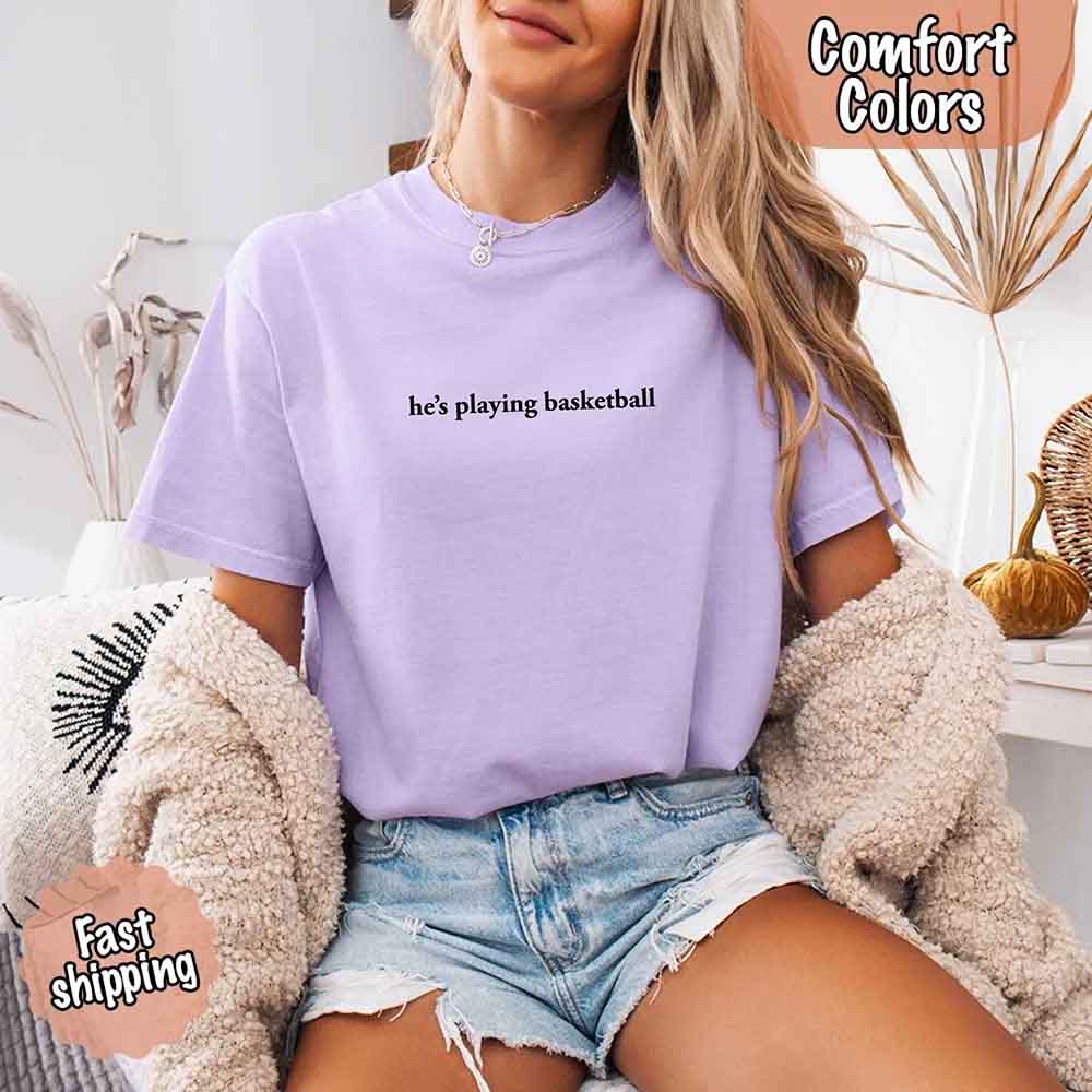 He’s Playing Basketball – Funny Sports Girlfriend Comfort Color Shirt for Women Adorb.co
