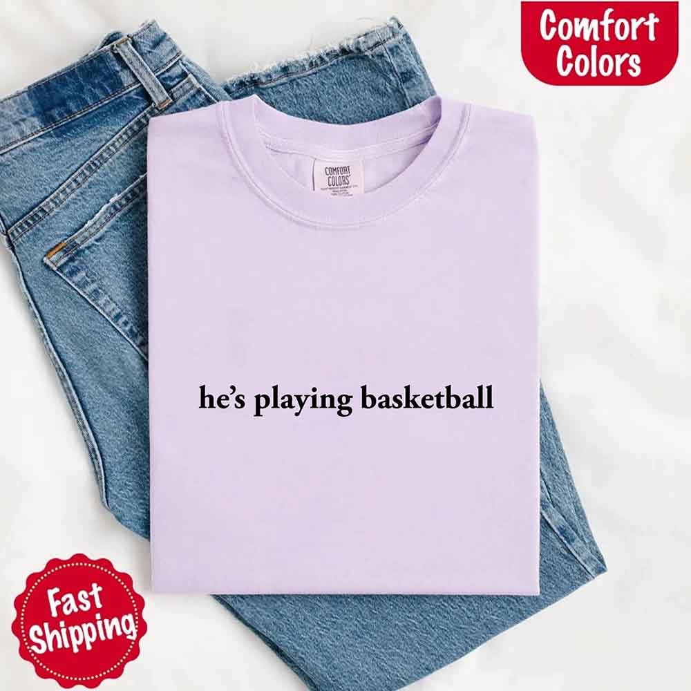 He’s Playing Basketball – Funny Sports Girlfriend Comfort Color Shirt for Women Adorb.co