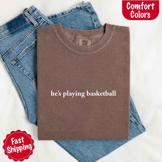 He’s Playing Basketball – Funny Sports Girlfriend Comfort Color Shirt for Women Adorb.co