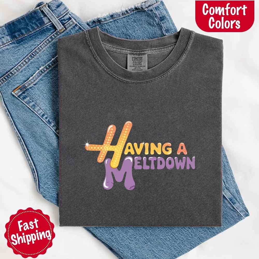 Lifestyle image of someone relaxing on a couch wearing the Adorb Custom Tees relatable tee, showing its casual comfort.