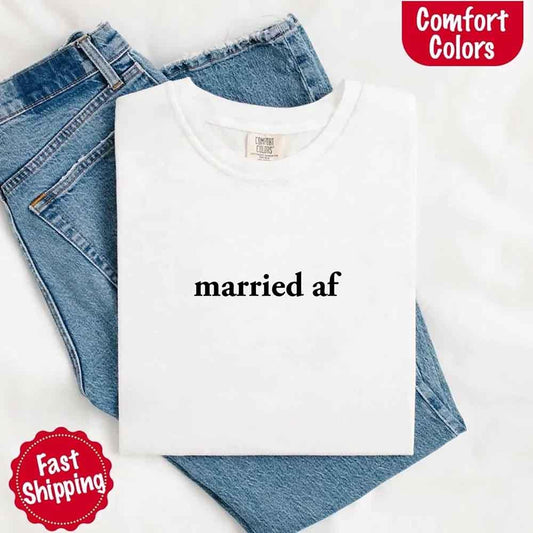 Adorb Custom Tees Married AF Comfort Colors T-Shirt in a soft, neutral color, shown flat for a clear view of the design.