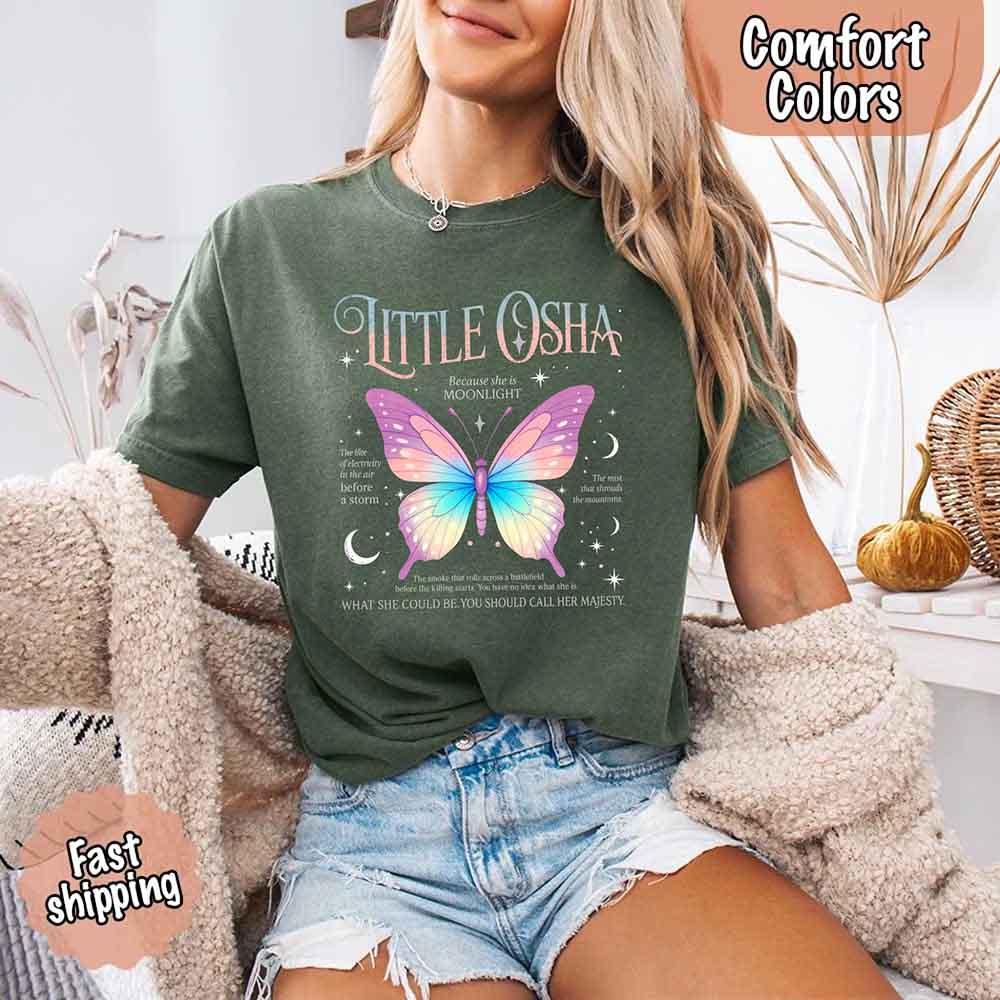 Adorb Custom Tees Butterfly Dreamscape Comfort Colors T-Shirt, presented on a hanger, highlighting its full aesthetic design.