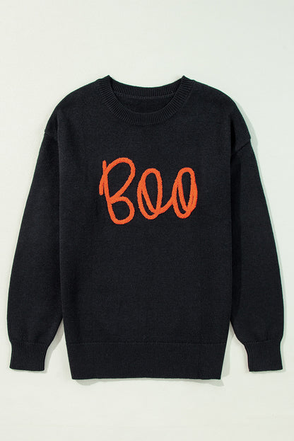 Cozy black "Boo" knitted sweater with ribbed edges for casual style