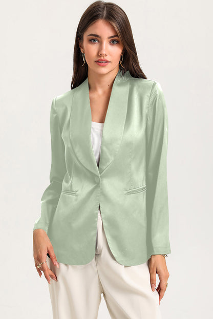 Elegant green blazer with collar and pockets for versatile style