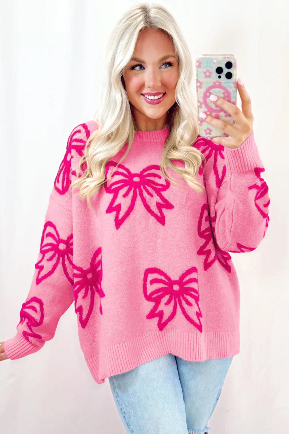 Feminine Pink Bow Print Loose Fit Sweater with Drop Shoulders