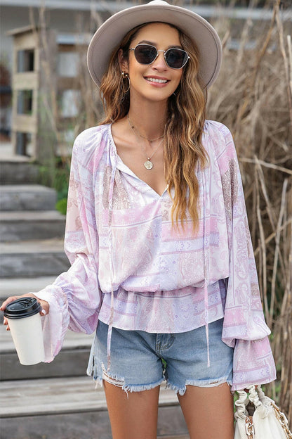 Printed Tie Neck Flounce Sleeve Blouse.