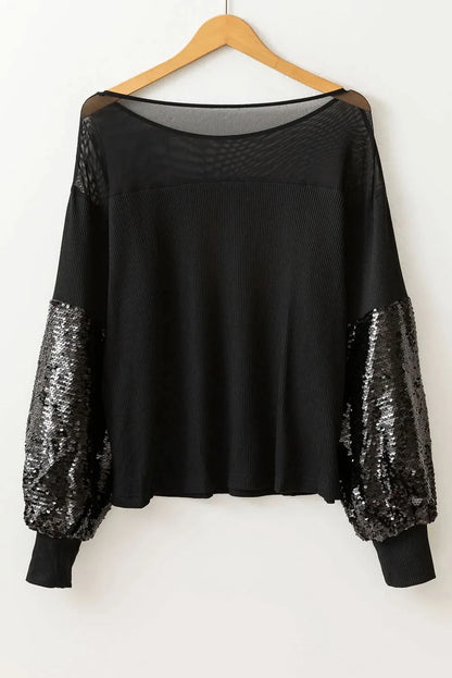 Glamorous sequined boat neck blouse with long sleeves