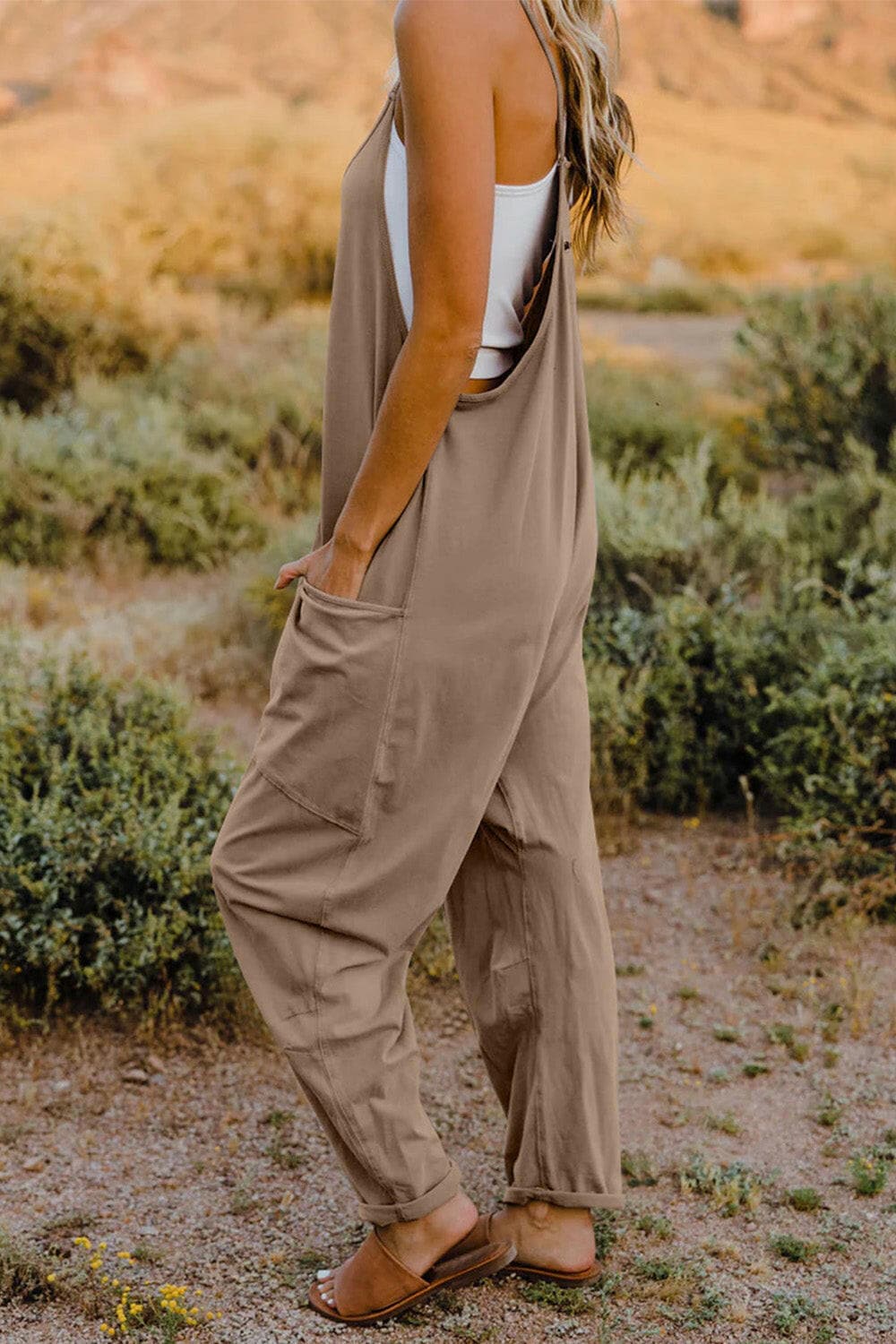 Double Take Full Size V-Neck Sleeveless Jumpsuit with PocketsUpgrade Your Style
 Introducing the Double Take Full Size V-Neck Sleeveless Jumpsuit with Pockets – where fashion meets functionality! This chic jumpsuit is designedLove Salve -Neck Sleeveless Jumpsuitusa