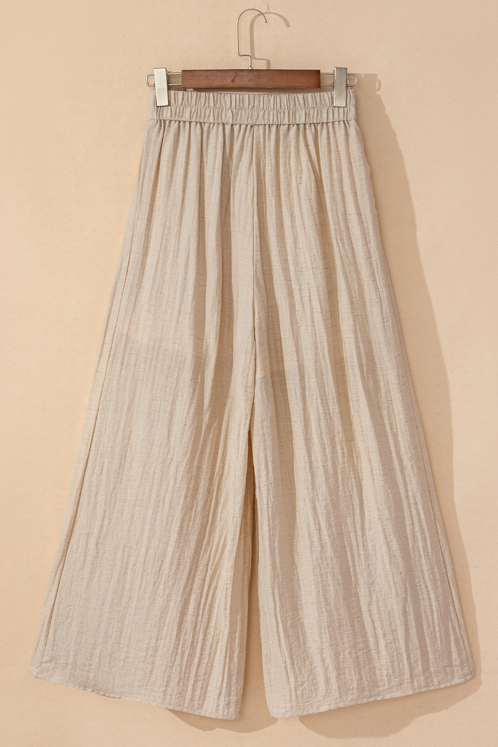 Beige high-waisted wide-leg trousers