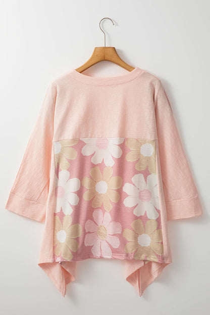 Floral V-neck blouse with three-quarter sleeves and high-low hem