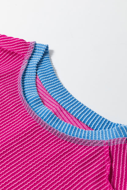 Vibrant pink textured t-shirt with stylish contrast trim