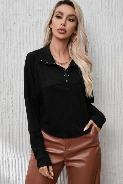 Ribbed Knit Henry Collar Loose Fitting Long Sleeve Top.