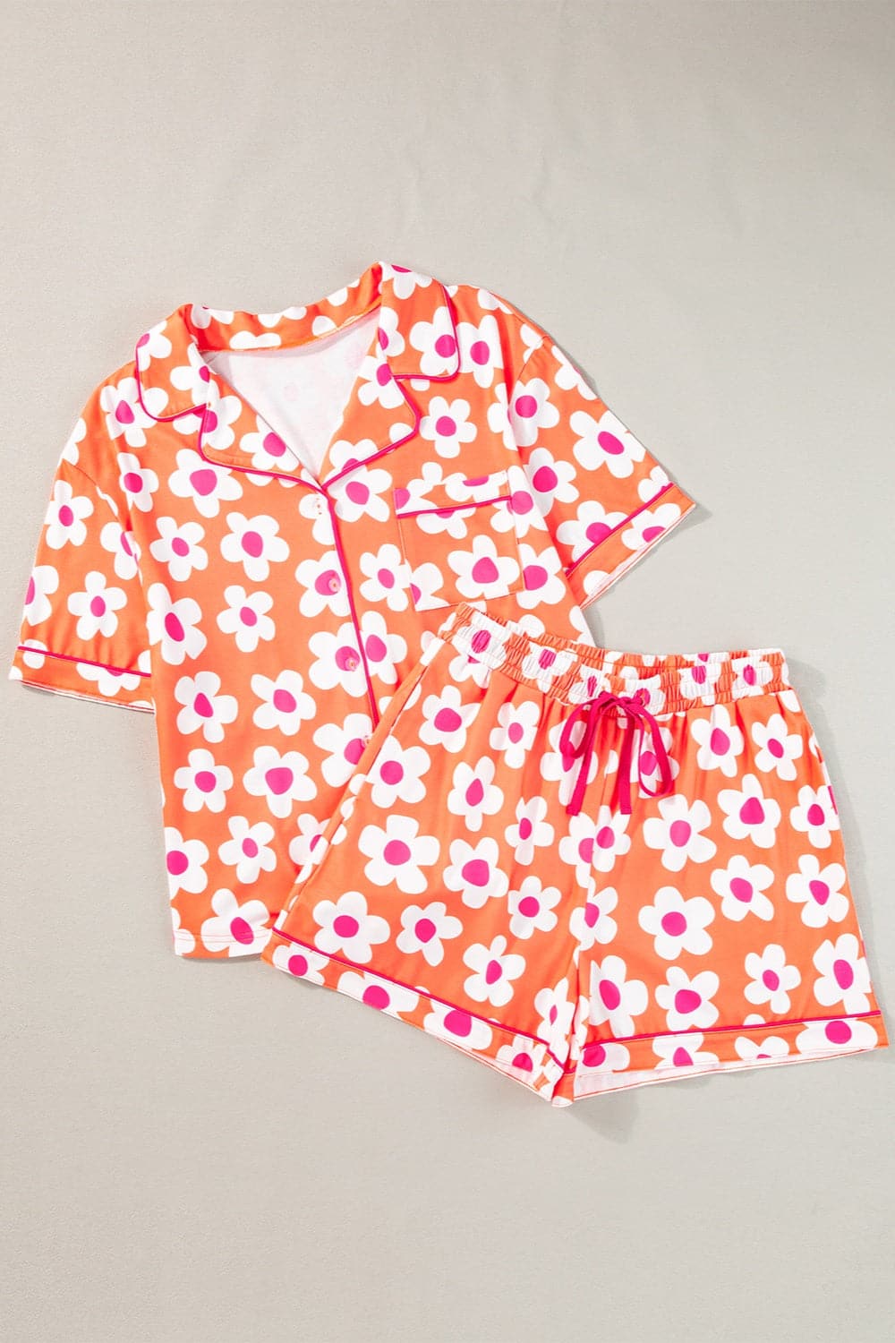 Pocketed Flower Half Sleeve Top and Shorts Lounge Set.