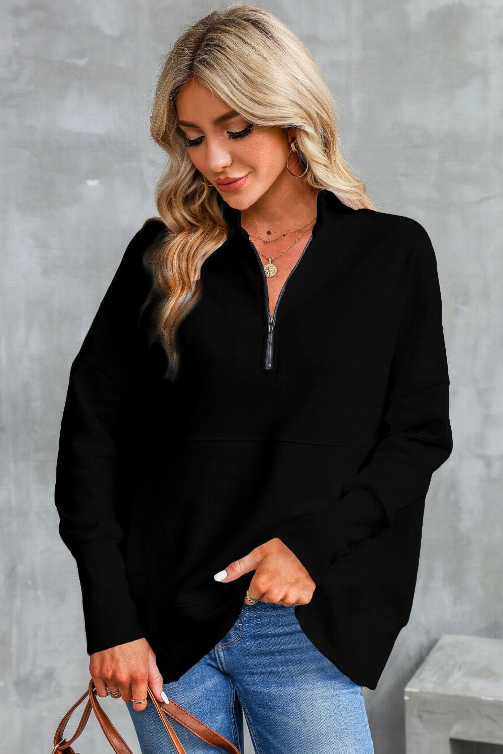 Half Zip Pocketed Dropped Shoulder Sweatshirt.