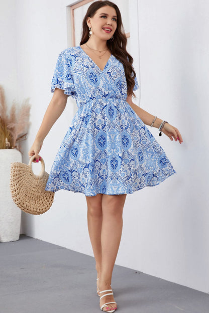 Plus Size Surplice Neck Flutter Sleeve Dress.