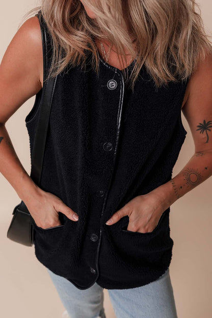 Sophisticated black fleece vest with button closure and side pockets