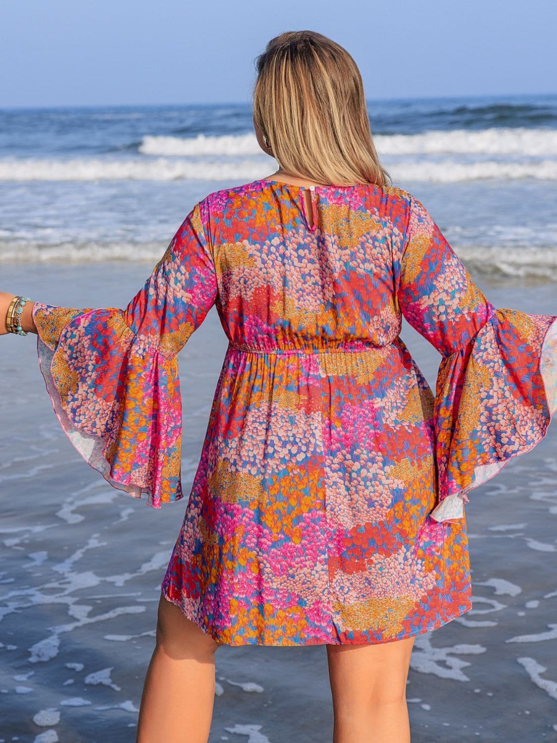 Plus Size Ruched Printed Long Sleeve Dress.