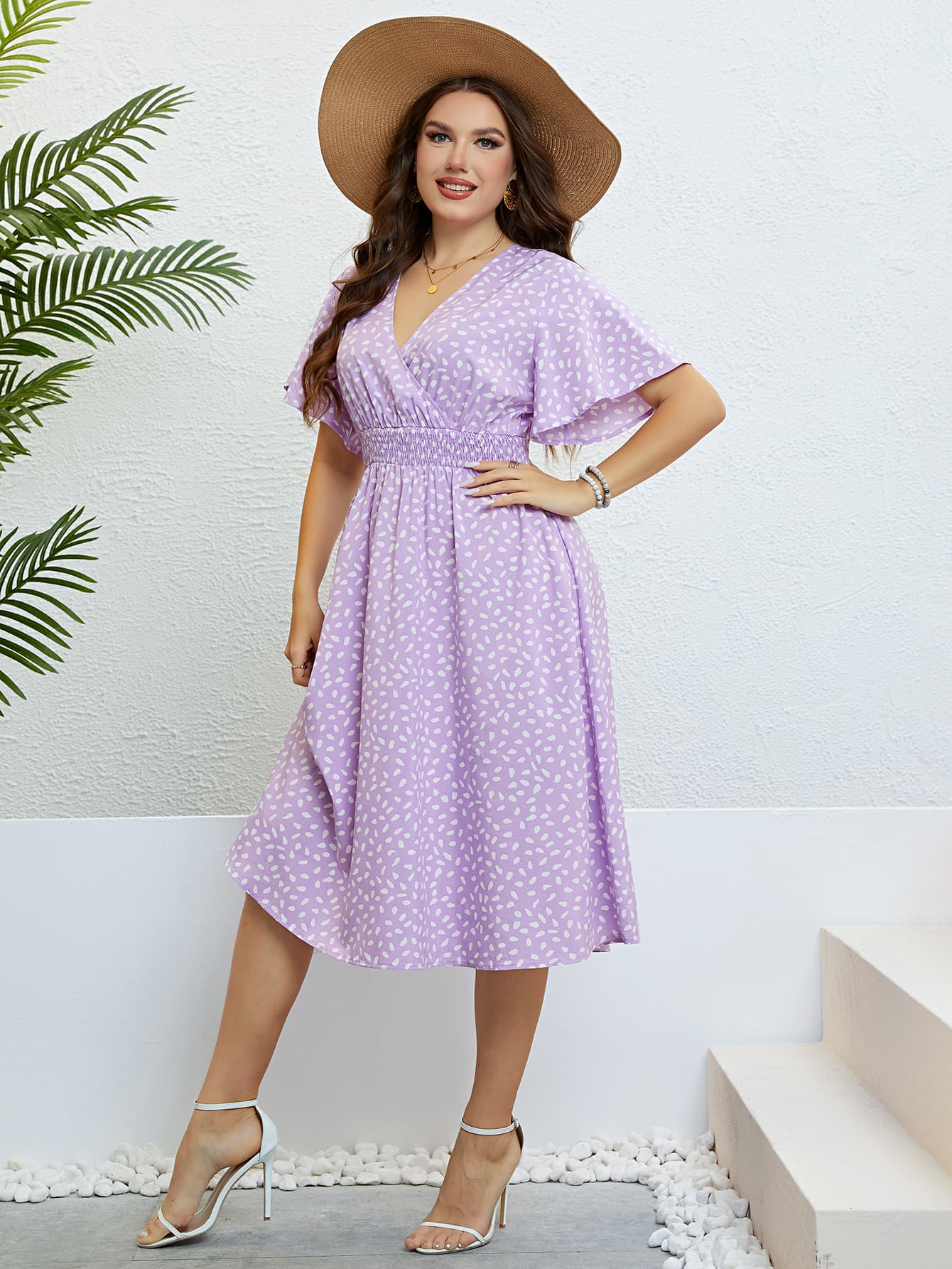 Plus Size Printed Smocked Waist Surplice Dress.