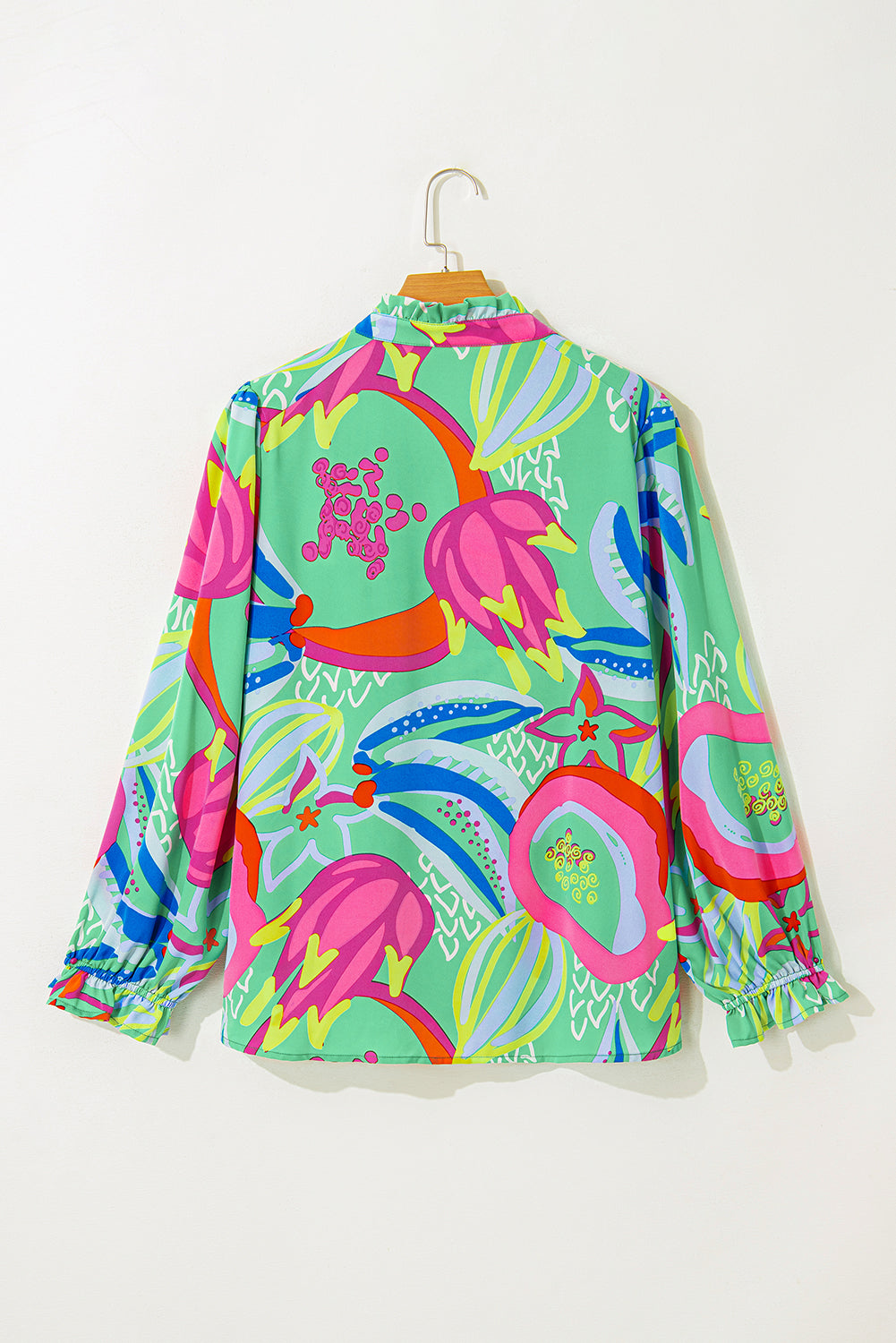 Flattering green abstract print plus size blouse with flounce sleeves