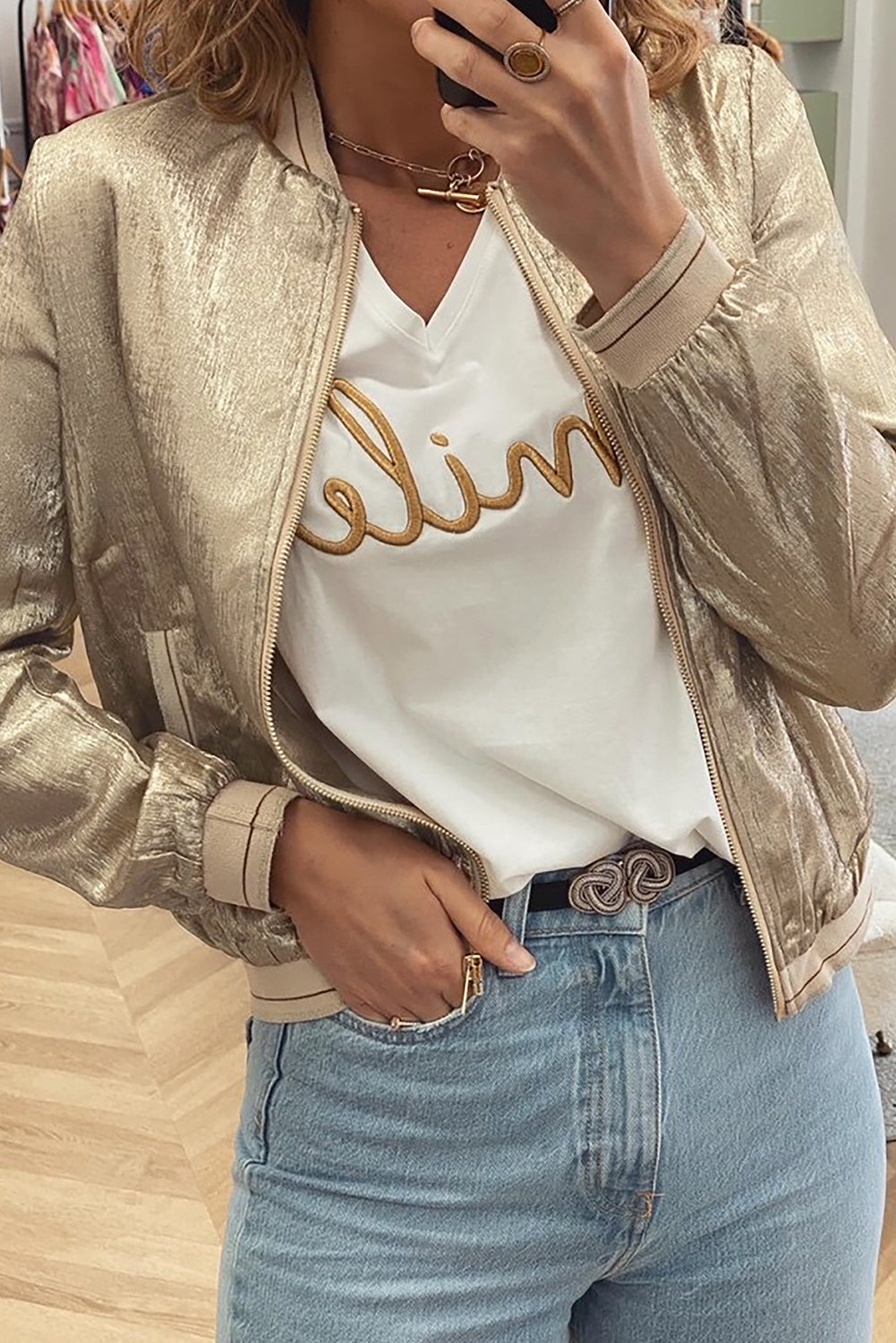 Shimmering pale khaki metallic baseball jacket with zip closure