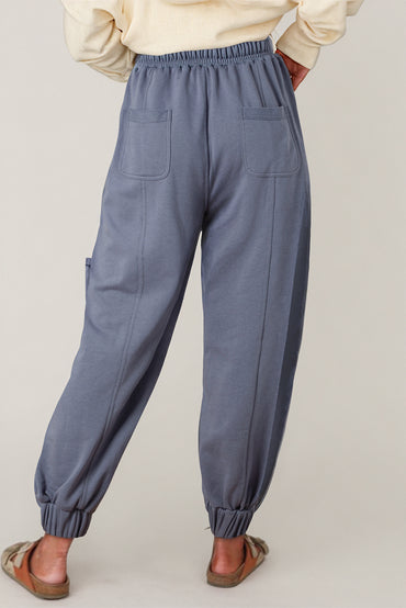 Trendy mineral wash harem pants with lace-up waist and multiple pockets