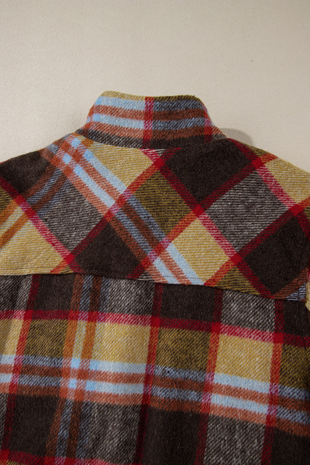 Stylish brown plaid jacket with chest pockets and stand neck design