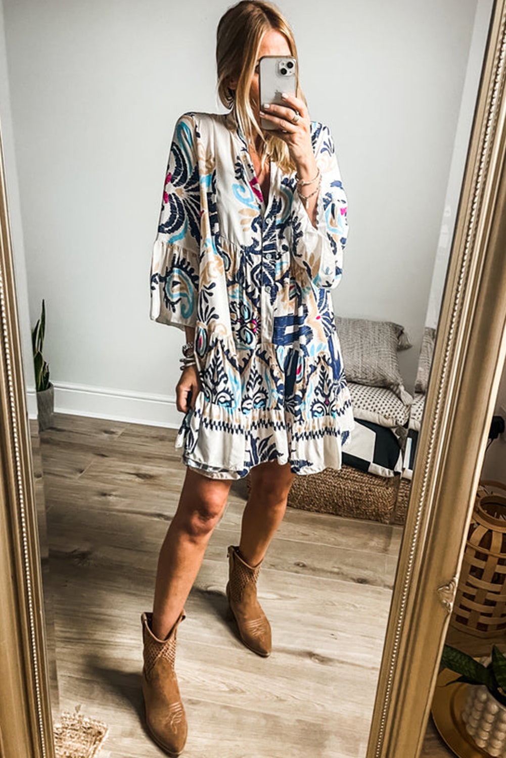 Tribal print mini dress with stylish bracelet sleeves and button detail