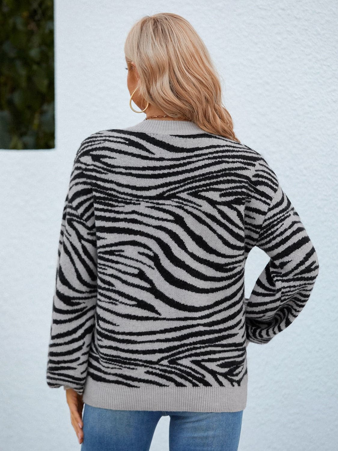 Animal Print Round Neck Dropped Shoulder Sweater.