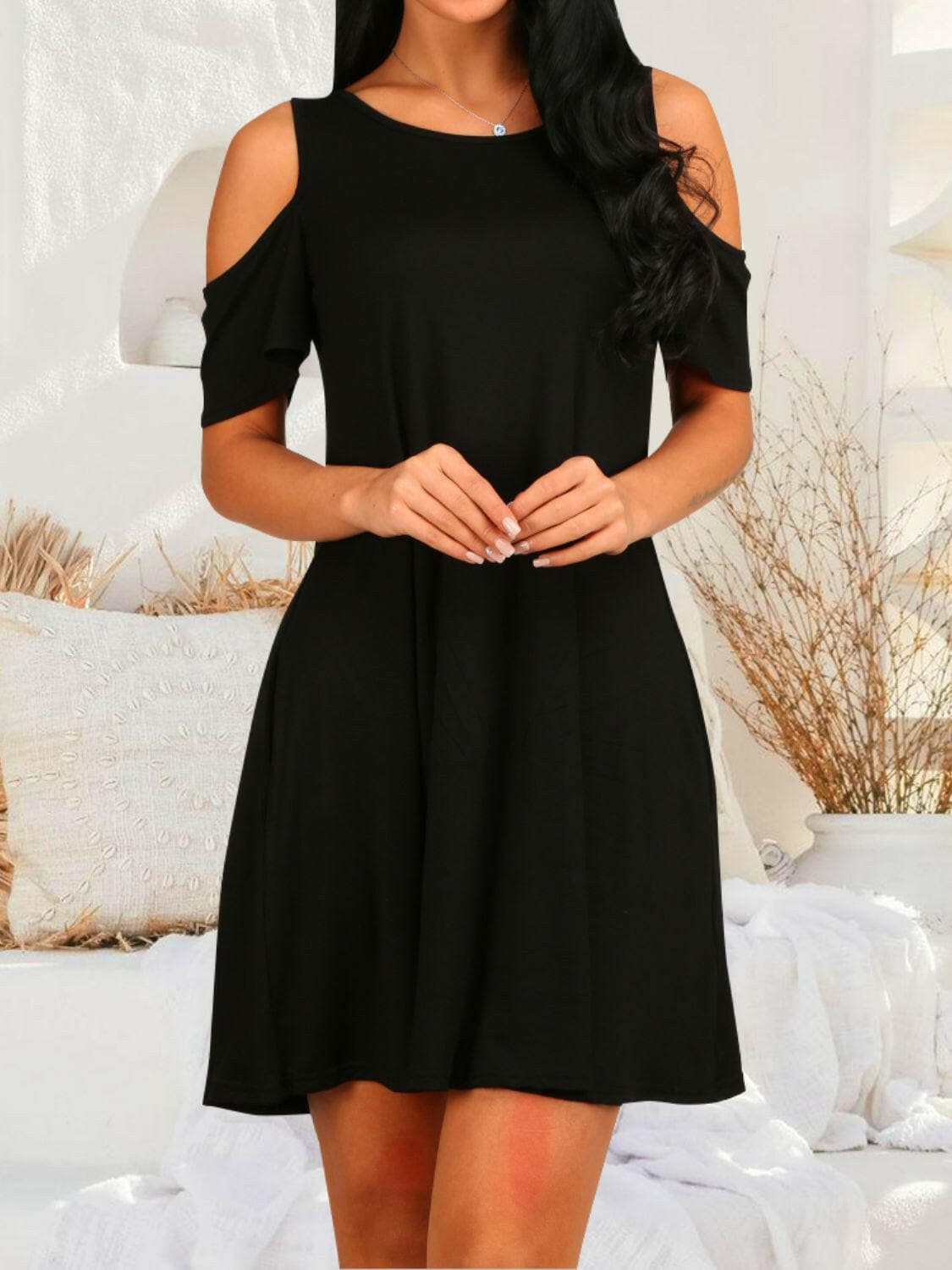 Round neck cold shoulder short sleeve dress in black, available in sizes S-2XL.