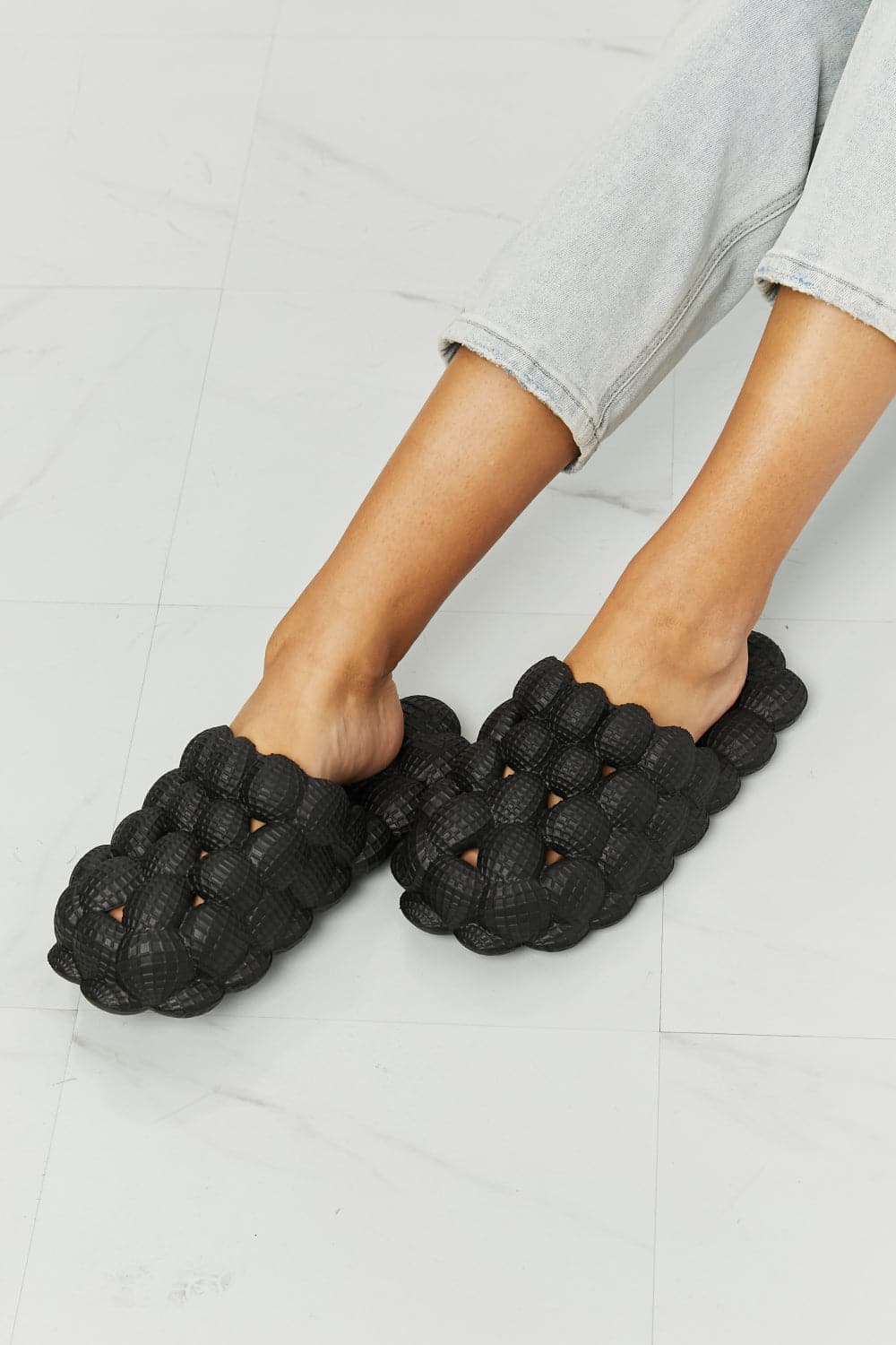 NOOK JOI Laid Back Bubble Slides in Black.