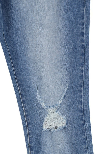 Stylish dark wash distressed skinny jeans for a trendy look