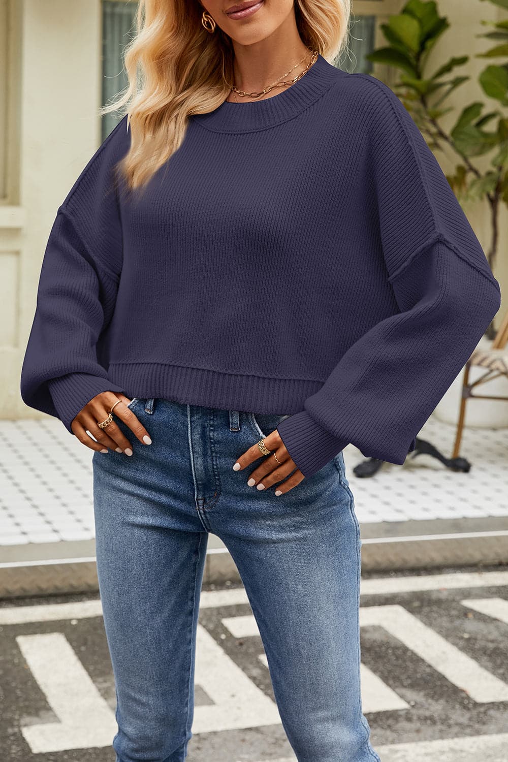 Round Neck Dropped Shoulder Sweater.