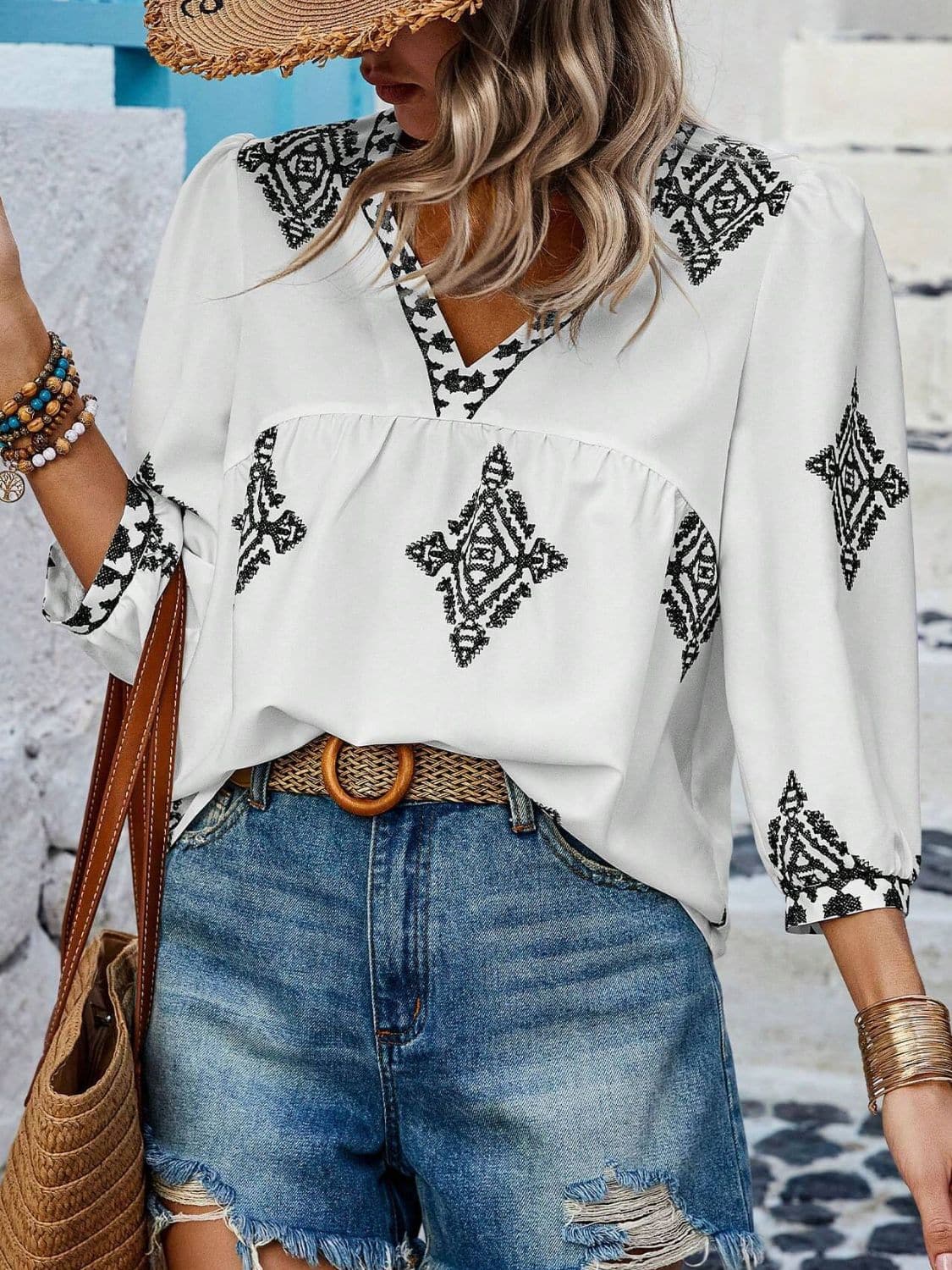 Printed V-Neck Three-Quarter Sleeve Blouse.