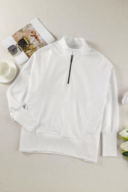 Half Zip Pocketed Dropped Shoulder Sweatshirt.