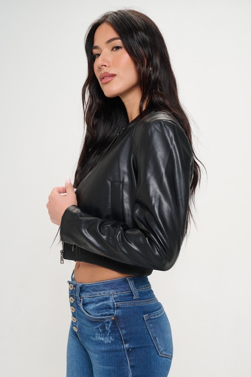 Coalition LA Zip Up Cropped Bomber JacketThis zip-up cropped bomber jacket is made with vegan leather for a stylish and cruelty-free option. The bomber style gives it a trendy and edgy look. It features a hLove Salve Coalition LA ZipOuterwear