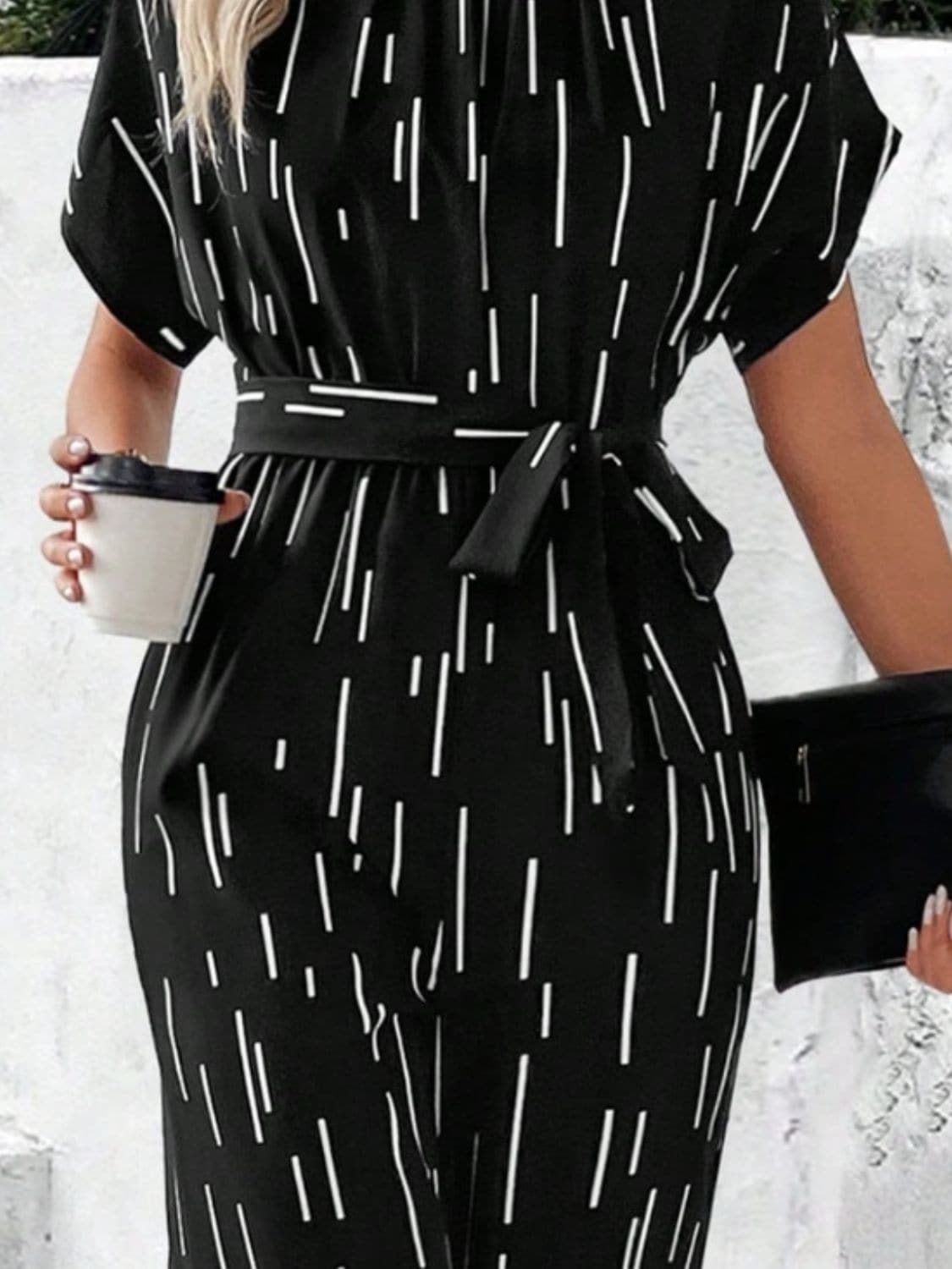 Tied Printed Mock Neck Wide Leg Jumpsuit.