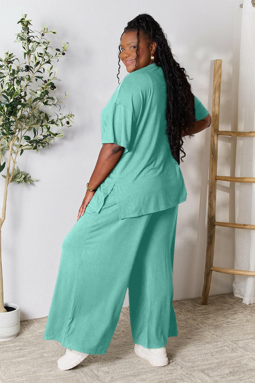 Double Take Full Size Round Neck Slit Top and Pants SetUpgrade Your Style with the Double Take Set
 Step into sophistication with our Double Take Full Size Round Neck Slit Top and Pants Set. This chic and versatile two-pLove Salve Full Size Round Neck Slit Topusa