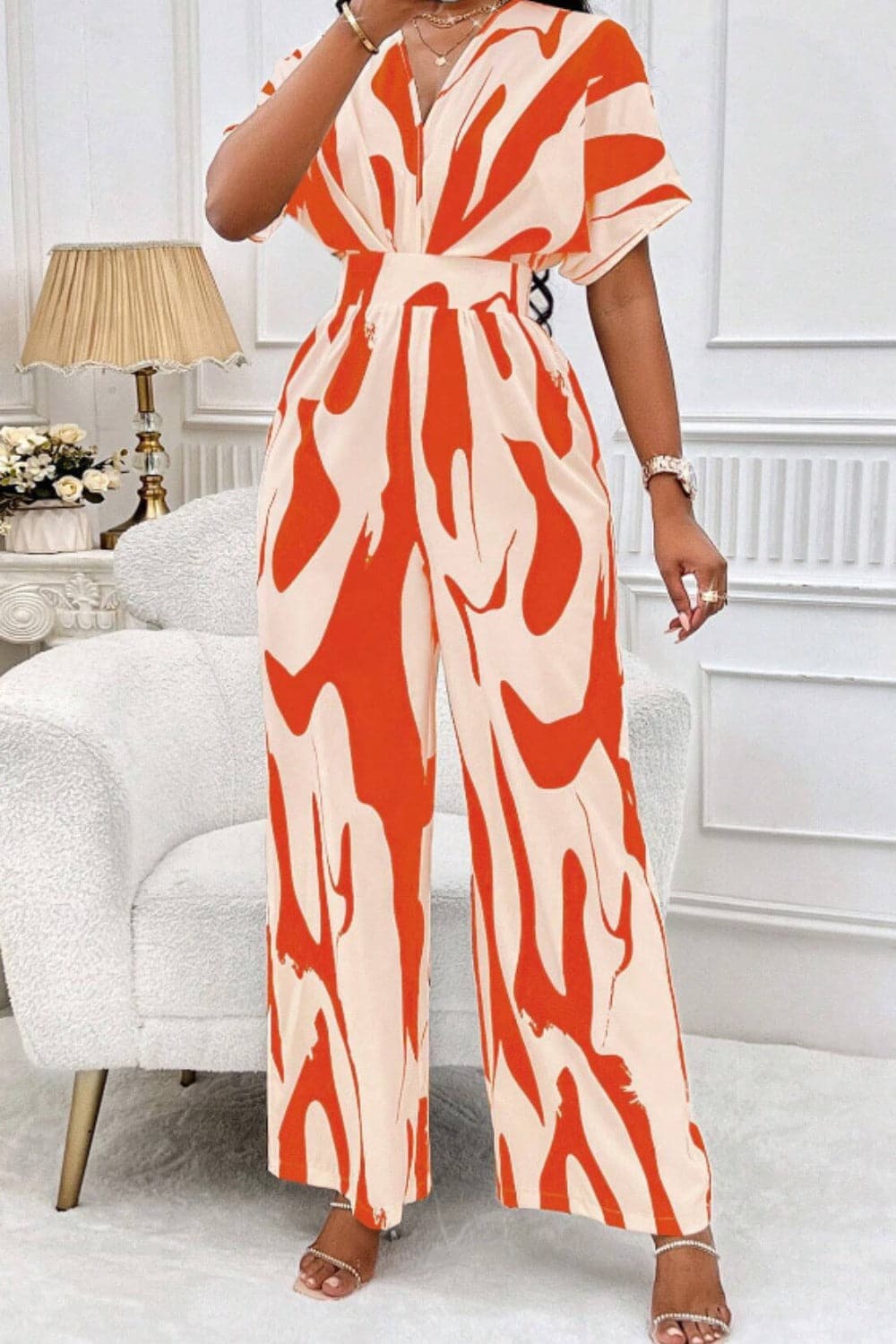 Printed V-Neck Short Sleeve Wide Leg Jumpsuit.