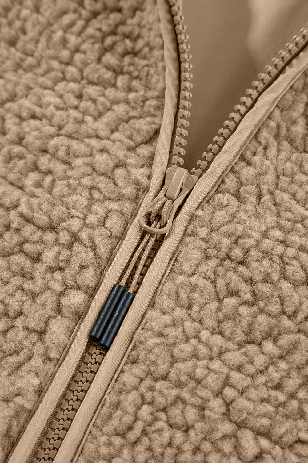 Interior view of the Love Salve Women's Hooded Fleece Jacket, revealing its soft lining for ultimate comfort.
