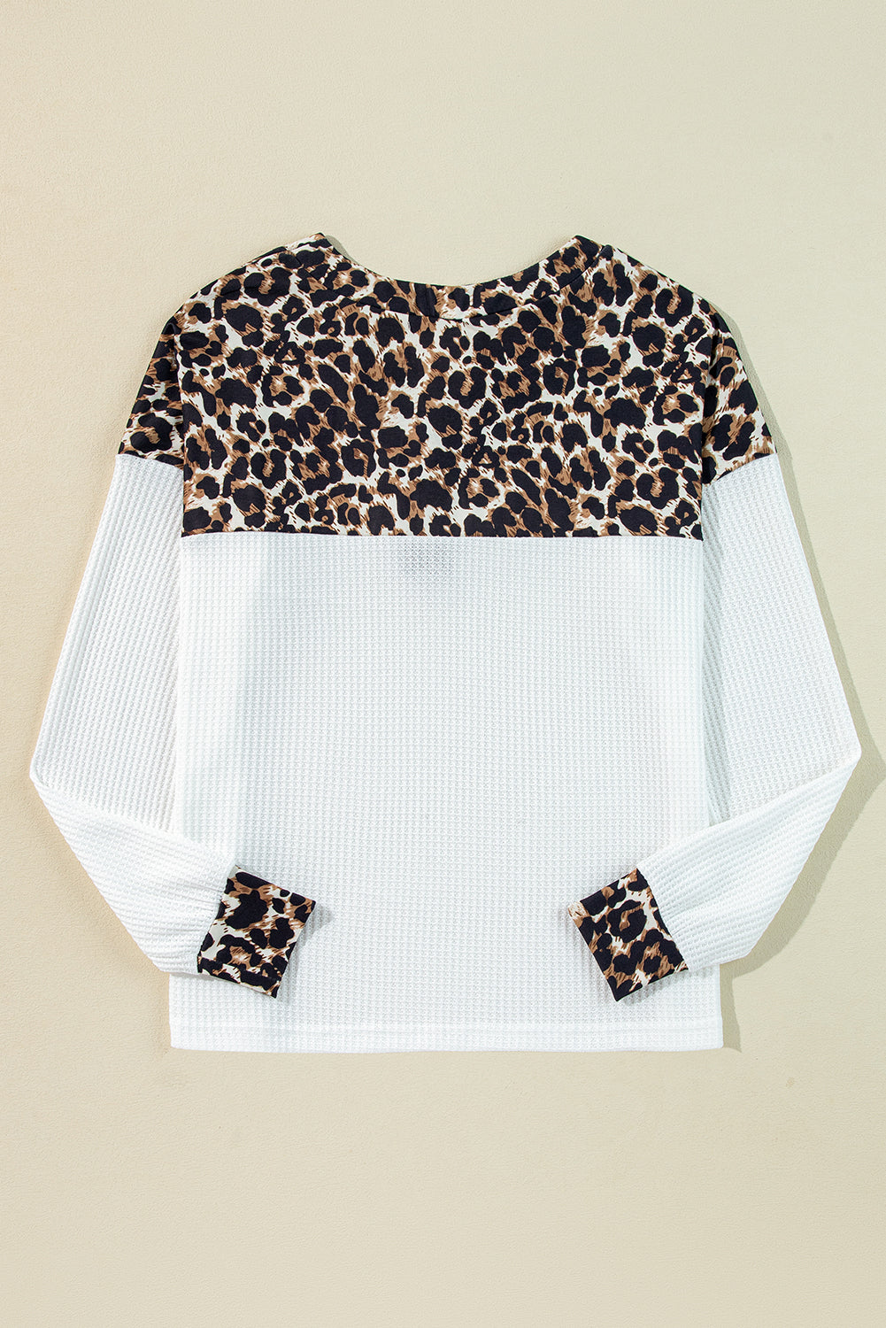 White leopard v-neck knit top