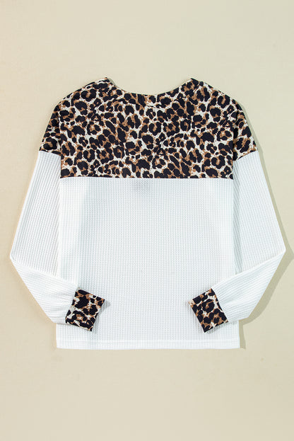 Stylish white leopard print waffle knit top with button details