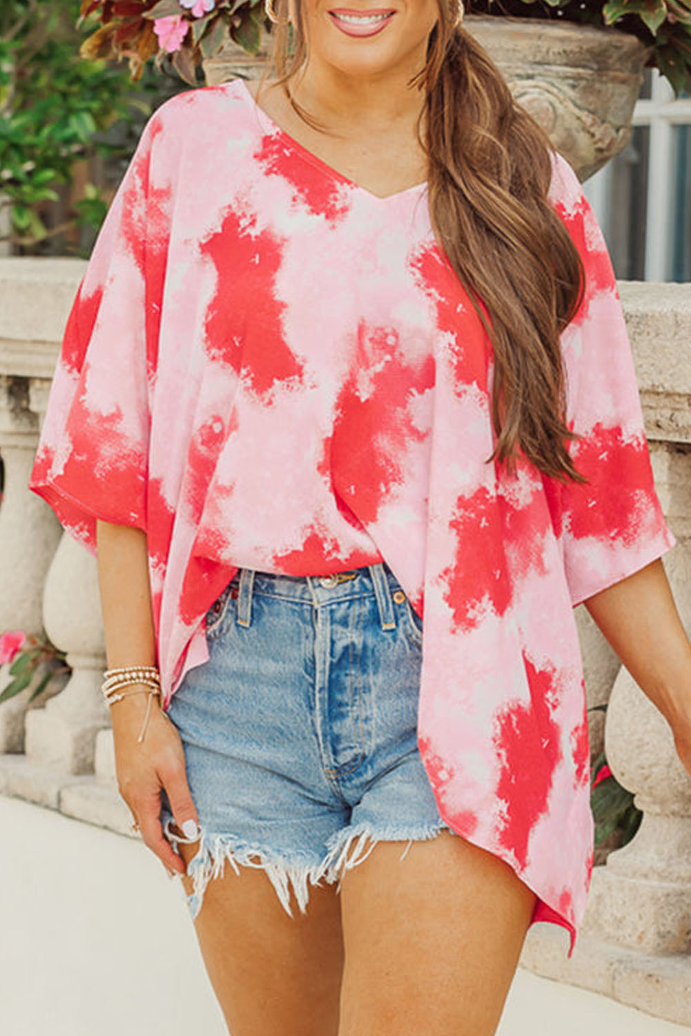 Vibrant red plus size tie-dye tunic with 3/4 sleeves