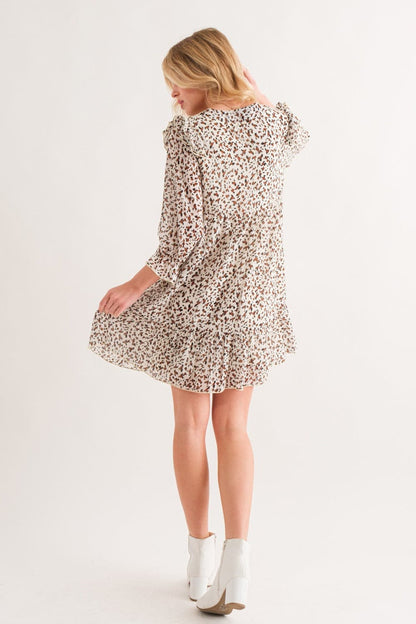 Wildly chic leopard ruffle hem mini dress