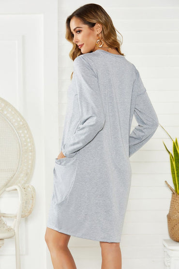 Cozy pocketed long sleeve dress with a chic round neck